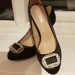Flore black satin  diamante buckle shoe, size 6, brand new, never been worn, ideal for that party outfit. paid £29
99, selling for £10