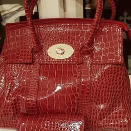 Matalan red/ pinky cast hand bag and purse to match,brand new, never used,ideal christmas present. paid £24.99, selling for £10