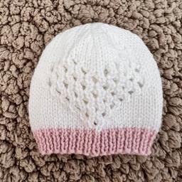 Newborn baby girls hats, hand knitted, the 2nd picture is actually pink, sorry for the lighting £2.50 each, postage available or collection Kingstanding B44