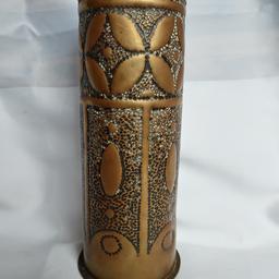 Antique curved solid brass WWI vase.  Dated April 1908. Approx 9"high, 3 2/4" in diameter ( base), 3" in diameter ( top). The top line has some dents, but still looks great and plenty lif in it. It is very good condition for its age. 
would be great addition for your collection or a great gift for antiques lovers.