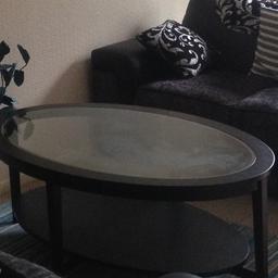 Big Ikea coffee table black with glass top.very good condition