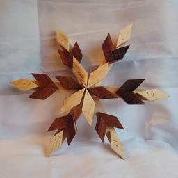 This is handmade wooden snowflake. Dimensions: 14"x 12 2/4"
Great for Christmas decoration.
Made to order