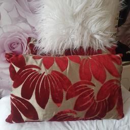 pair of rectangle design Dunelm cushions, never been used,and a square shape fluffy cushion, all fir £10