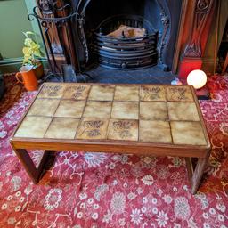 Mid century 60s teak coffee table with decorative tiles built by Keith Eatwell furniture. Legs show signs of wear over the years. Heavy quality.