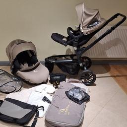 Jané Trider with Matrix 2 seat and many extras costing over £1,000 new.

Used for many years so shows some signs of cosmetic wear and tear (see photos) but in good overall condition.

Bundle includes:
- Jané Trider 3 wheeled pushchair with detachable cup holder, changing bag with changing mat, Snoozeshade sunshade, Parasol holder, Girafge motif foot muff, sun shade and rain cover.
- Jané Matrix 2 car seat with Giraffe motif cushion, mattress, sun shade, foot muff and rain cover