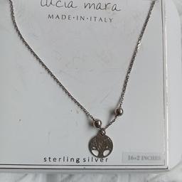 Lucia Mara sterling silver tree pendant necklace. Chain us 14" invtotal. New in presentation box. Collection only.