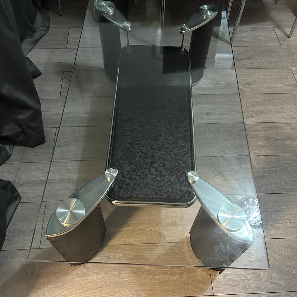 Glass coffee table
Leather legs
Few wears and tears on legs
No scratches on glass
Matching dining table listed on Shpok too, if both taken together can do good price