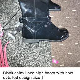 brand new knee high boots with bow detailed design on the back can be used as a school.bopts or general boots pics don't do them justice they are amazing