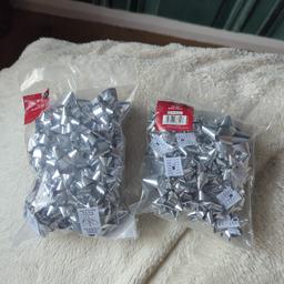 brand new unopened
2 packs of silver bows 
£1
more than happy to combine postage on other items