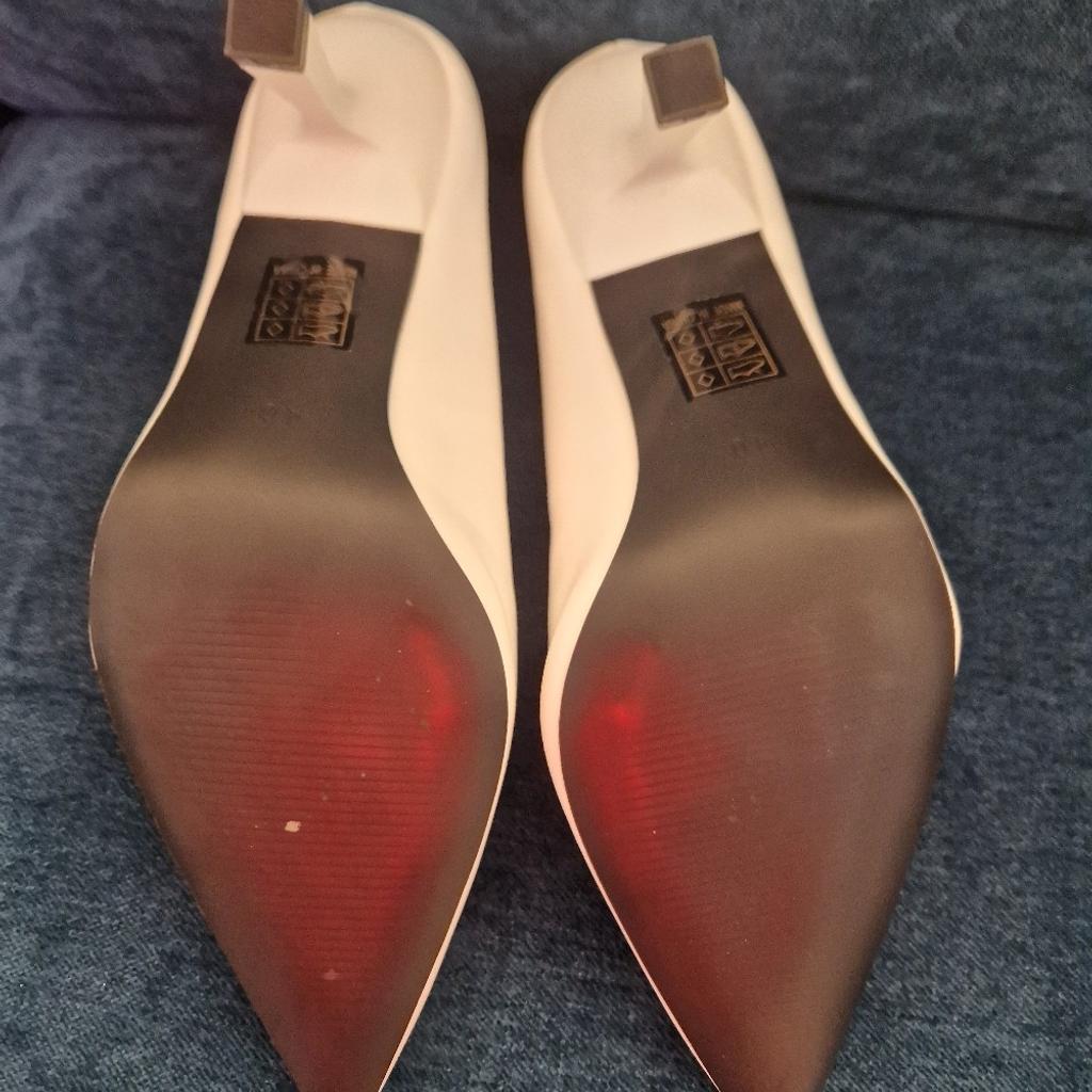 Brand new white heeled shoes from Schuh. Size 7 with 3in heels. Original packaging