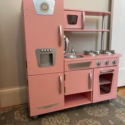 Modern play with a vintage vibe! This is a gorgeous wooden retro style play kitchen, which we have loved! Our girls will be sad to see it go 🙈 but they are growing up and we just can’t keep everything. There are a few scratches that you can see in the photos, and a little dent in the plastic on the oven door, but nothing too noticeable. 
Dimensions:  84cm long, 34cm wide, 89cm tall, and the counter height is 45cm. 
Cash on collection.