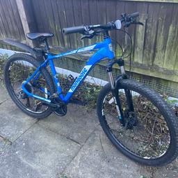 A blue mongoose villain 3 mountain bike size L. 27.5 in wheels top speed 24 miles per hour great condition and sharp disc brakes worth £375 selling for £200