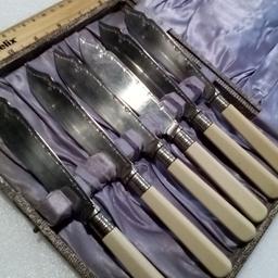 Antique English Boxed Set of Fish Knives.

Probably wedding gift from 1940s.

Faux bovine handles in the early stages of pressed molds, no visible cracks or damage. In original box. Outer box quite tired and scuffed, but once again early stages of mass production after the war.

As a size indication the knives are 17 cms long , made with steel nickel.

Great addition to a collector of this era, or for an upcycle project.

Local collection preferred or can be posted out at extra costs.