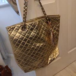 gold bag. ideal for Christmas. have tiny bit of wear on the handle from storage but never used. collection only please 👍