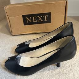 Next ladies black leather open toe shoes , small kitten heel around  2/3 inch heel , leather material , only been worn a couple of times , few small marks but nothing bad , please see photos , great for all occasions.
Size 5 1/2 ,
Good worn condition ,
I do not refund , payment to be made straight away please , 
I send the item in 2 nd class recorded post ,