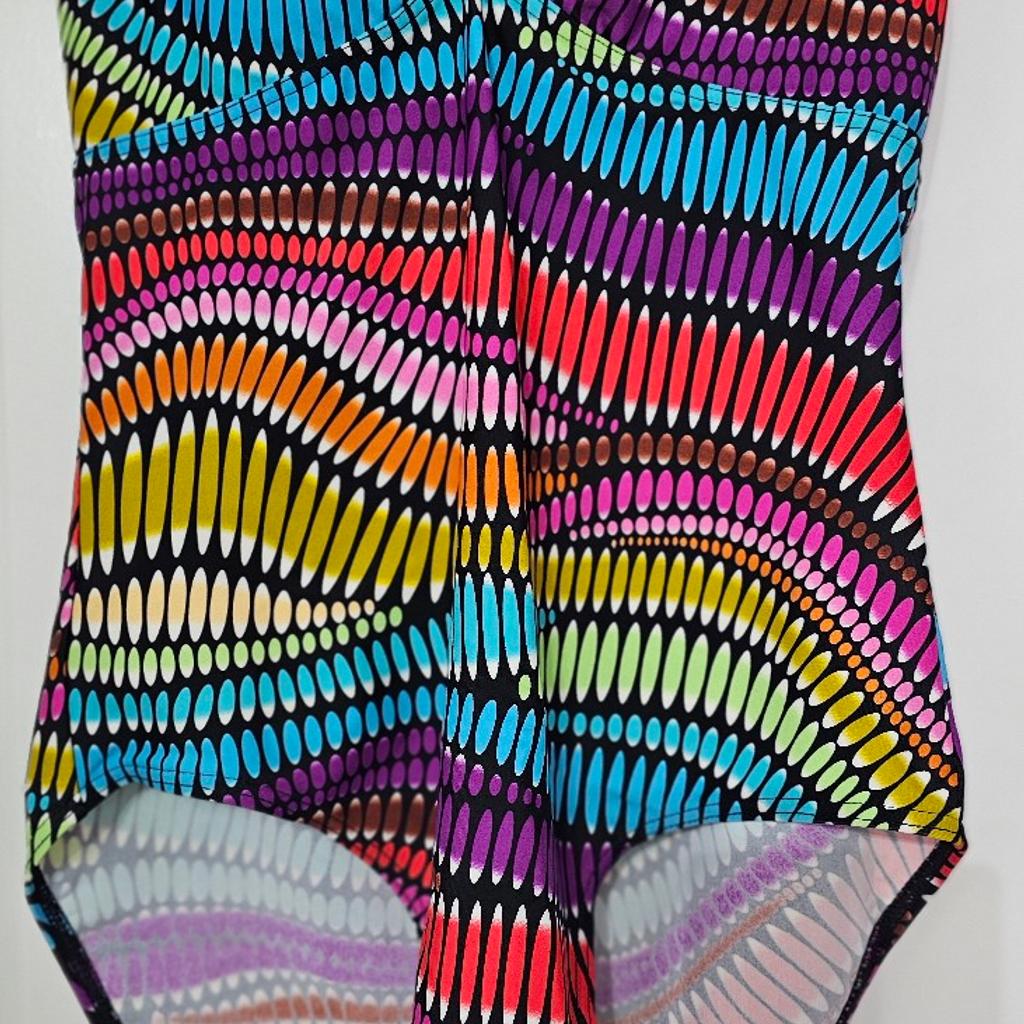 Brand New
Elevate your swimwear game with this stunning multicoloured swimsuit in size 16. The bralette style top with halter straps and built-in bra offers ample support while the swim briefs provide the perfect coverage. The geometric pattern adds a fun touch while the polyester and elastane material make it machine washable for easy care.
Perfect for any water activity, this one-piece swimsuit is a must-have addition to your wardrobe.