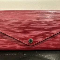Red leather authentic Louis Vuitton purse (cards and notes only). No zip section hold cards and notes. Manufacturers code (see image). In immaculate condition.