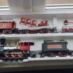 Christmas Train & Track, plays Christmas tune or engine noises
used once
Takes batteries