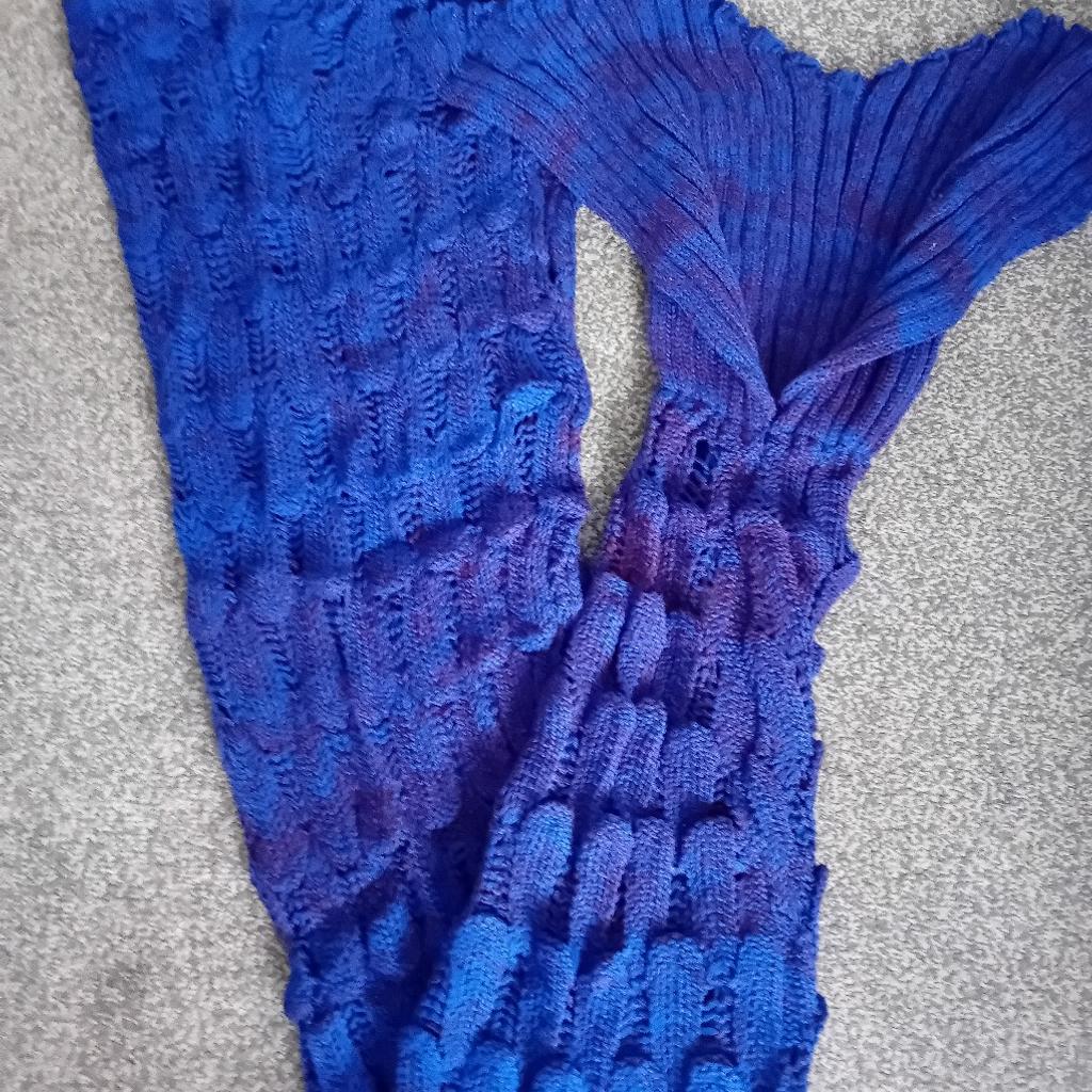 New - Taken out for pictures only
Navy Blue Fishtail Blanket
Folded in half on these pictures
Roughly 60 inches top to bottom
I do have multiple available (open to offers)