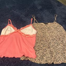 2 strappy top
1 pink with white and lace, stretchy material from primark size L 
Leopard print from new look size 14
