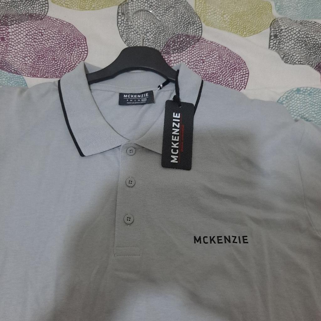 brand new mens mckenzie polo shirt with tag .