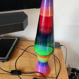 16 inch tall lava lamp, multi colour with white lava, just needs a new bulb (25w R39) 

collection only from S63 area
