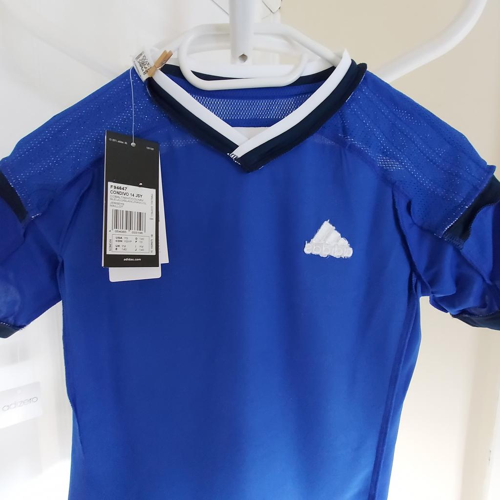 T-Shirt “Adidas“Performance

 Adizero Clima Cool

Football Jerseys Maillot

Cobalt Mix Colour

 New With Tags

Actual size: cm

Length: 51 cm

Length: 32 cm from armpit side

Length sleeves: 27 cm from neck

Volume hand: 30 cm from neck

Volume bust: 73 cm – 75 cm

Volume waist: 70 cm – 74 cm

Volume hips: 70 cm – 74 cm

Size: YM, 9-10 Years (UK)

Eur 140, US YS

Main Material: 100 % Polyester

Made in Cambodia
