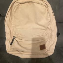 Cream coloured Vans backpack. Some cosmetic marks due to use but otherwise in good condition.