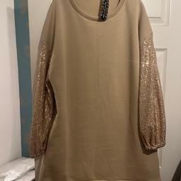 Ladies long sweatshirt dress or long sweatshirt with side pockets with sequin long sleeves one size fit up to size 20 brand new with label from Iceicle Boutique