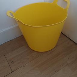 yellow heavy duty flexi plastic bucket, ideal for laundry, gardening or storage, approximately 35 litre.
