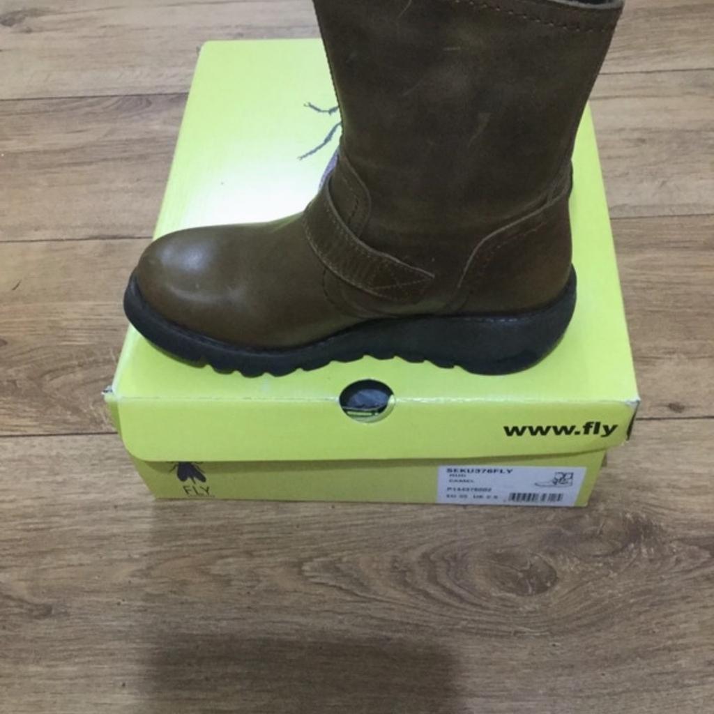 New still in box size 2.5 camel colour, fly London boot, lovely boot.