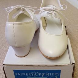 Tappers and Pointers, Cuban Heel, Tap Shoes.

Features:
Size Adult 4H
Colour White
PU and Two Tie Eyelets.
Cast Iron Front Toe Taps only.
For information: Heel taps can be purchased and fitted.

RRP £24

In excellent condition, as new in Box, worn once.
From a smoke free home.