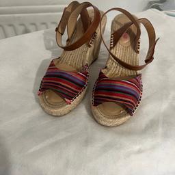In good condition worn a couple times.  3 inch heels wrap around ankle.
