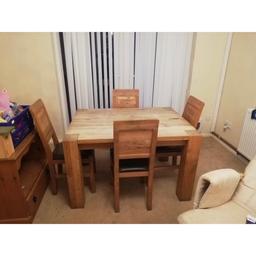 Solid oak dining table & four chairs with brown leather padded seats. 120cm L X 87cm W X 77 H approximately. Must be seen, collection from Wilmington DA2 tel : 07949972881