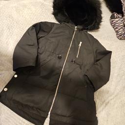 super warm full lenth zara coat with full fur hood. inside has fur which is sooo soft also. there clip buttons down the bottom of each side for design and you can pull the coat In at the waist if you would like to . there's lots of pockets and itvsjustva beautiful  coat.
in perfect  condition.  I'm not the best at taken photos but I've tried my best . 
believe  me this is going to keep you littke one warm during these cold winter day amd nights 
offers welcome  and I will post