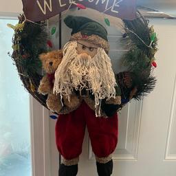 Christmas welcome front door wreath
Made from wicker, includes lights .