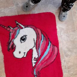 girls unicorn rug dark pink with unicorn on. fluffy ideal for bedroom. in good condition clean selling as daughter t old for unicorns.