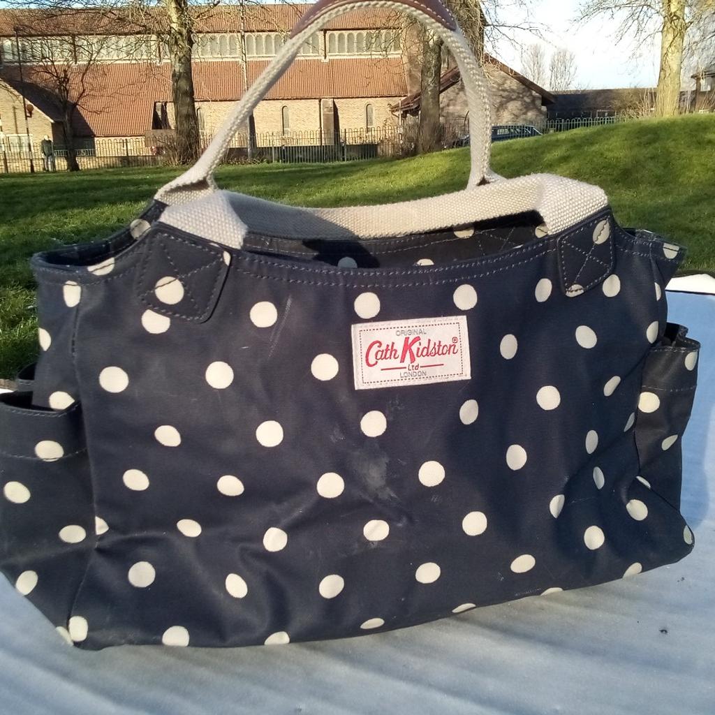 Cath Kidston bag blue with polkadots design.

Has some brush marks on it but try to remove them tomorrow, & then relist. Priced accordingly in present state, so if some wishes to purchase, you're welcomed.

Still a great practical everyday bag.
Local collection preferred or can be posted out at extra costs.
