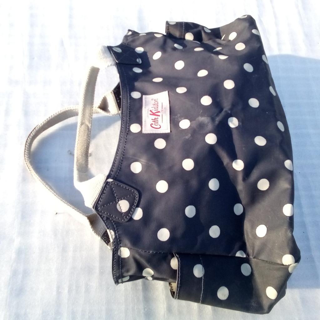 Cath Kidston bag blue with polkadots design.

Has some brush marks on it but try to remove them tomorrow, & then relist. Priced accordingly in present state, so if some wishes to purchase, you're welcomed.

Still a great practical everyday bag.
Local collection preferred or can be posted out at extra costs.