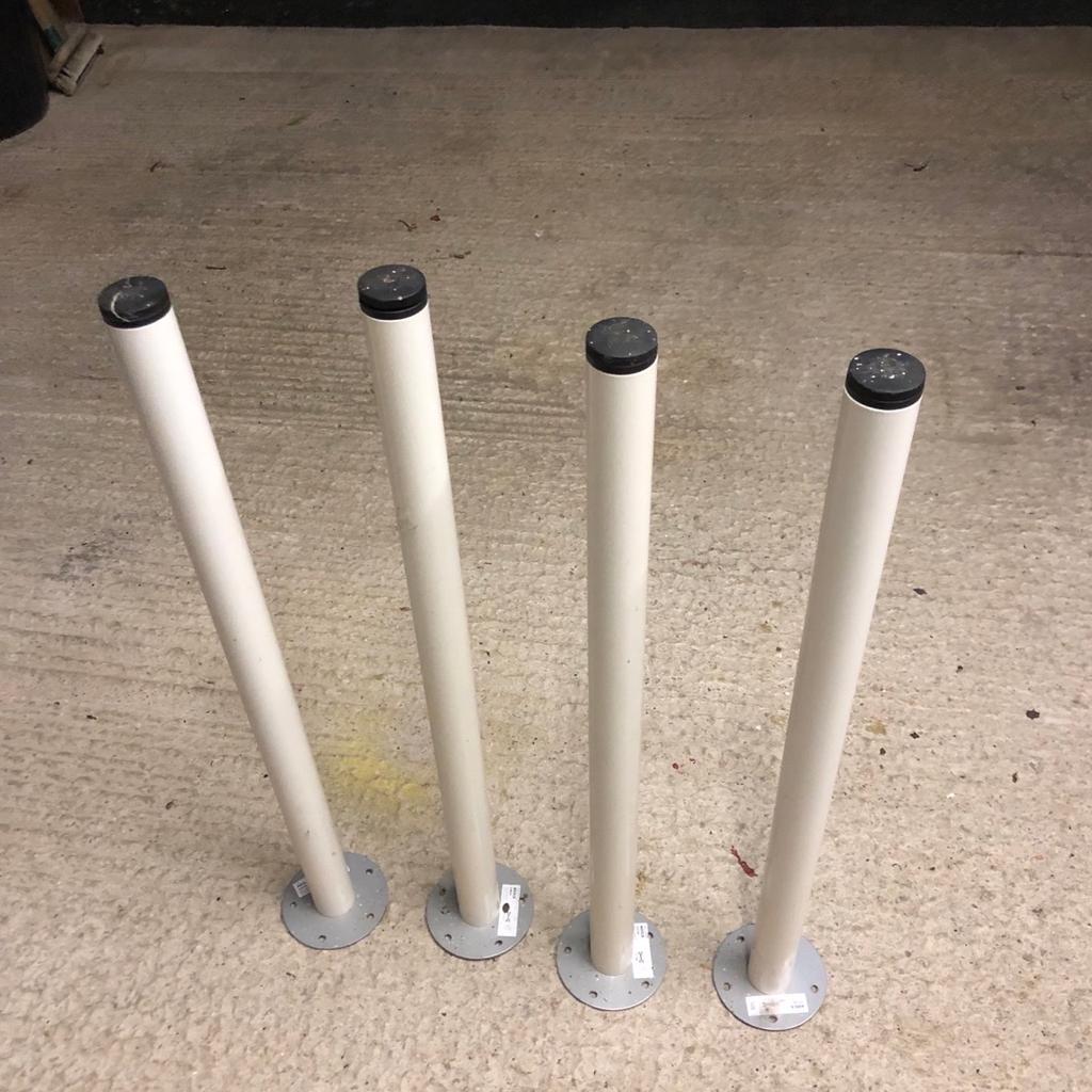 Four White Table/Desk Legs in a very good condition.