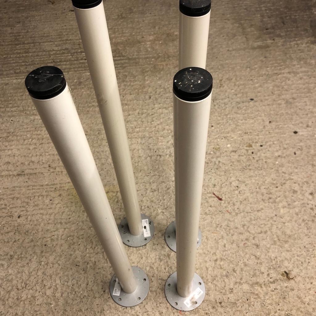 Four White Table/Desk Legs in a very good condition.