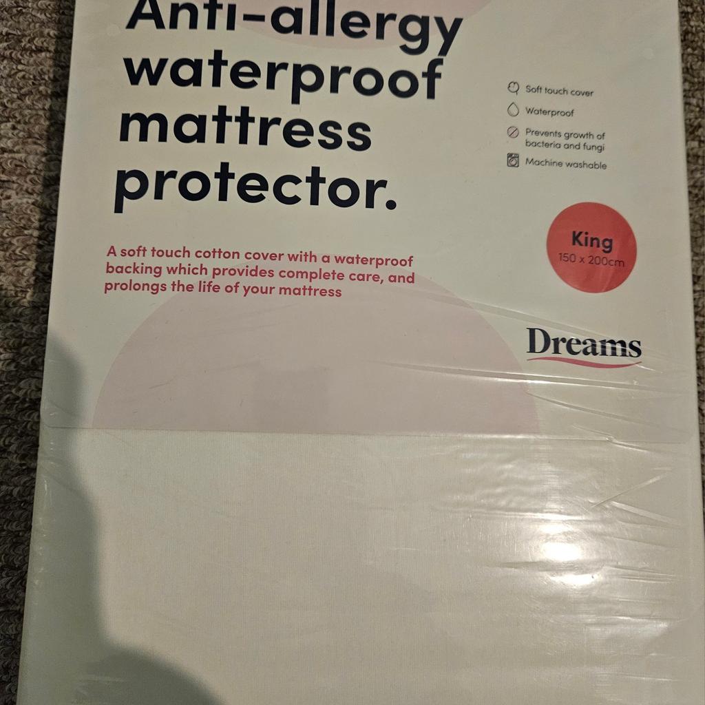Dreams Waterproof Anti-Allergy Mattress Protector (King Size). Brand new item. Not even opened. Unwanted item. Can post but will incur postal charges.

Waterproof backed soft pure cotton cover to prolong the life of your mattress. Anti-allergy filling to relieve potential irritations during sleep. Machine washable at 40°C.

Fits mattress up to 38cm. Anti-allergy bonded hollowfibre filling. Cotton flannel and microfibre face.

Measures:55 x 38 x 37cm.