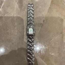 DKNY watch silver color trendy for females. Currently battery gone will need renewal