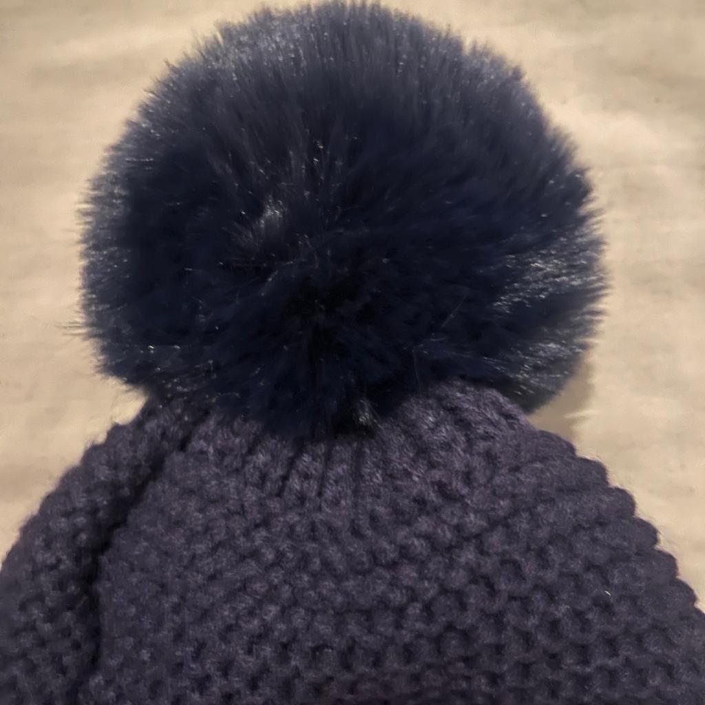 Ladies navy woolly hat with fur bobble and diamonte detail brand new from Iceicle Boutique