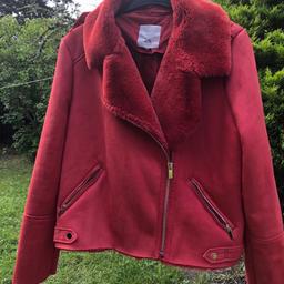 Beautiful  River island red aviator jacket. Beautiful suede red jacket with cosy thick full lining to inside . Aviator classic style and details . Great condition was over £80 . Lovely jacket .