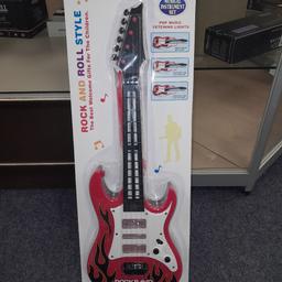 Children's toy guitar. battery operated uses 3 aa batteries. brand new and sealed.

Only £10.

collection in jb bargains, arndale, Accrington Bb5 1ex.

please check out my other items.