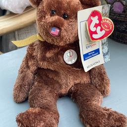 Ty beanie baby bear. FIFA World Cup 2002 Korea/Japan official mascot. USA flag nose. Excellent condition. Official merchandise. Comes with tags which are creased in places. Collectable.
