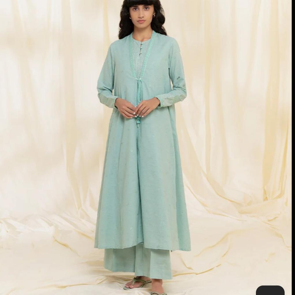 sapphire embroidered gown with sleeve less shirt and bellbottom