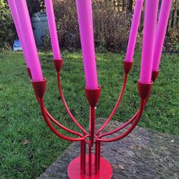 Beautiful vintage ikea candle holder . This is a Stockholm 8 arm metal holder . Rare red one Great with or without candles ( not included ) . Looks amazing as a centrepiece or in a window . Great substantial piece.