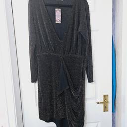 Lovely black dress with small gold coloured sparkles, v style neck and gathered detail on the skirt, size 20..NEW with tags.

cash and collection only, thanks.
possible delivery to Conisbrough on Saturday mornings only between 10.30 and 11am.
